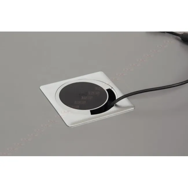 Passe câbles avec chargeur Smartphone par induction.