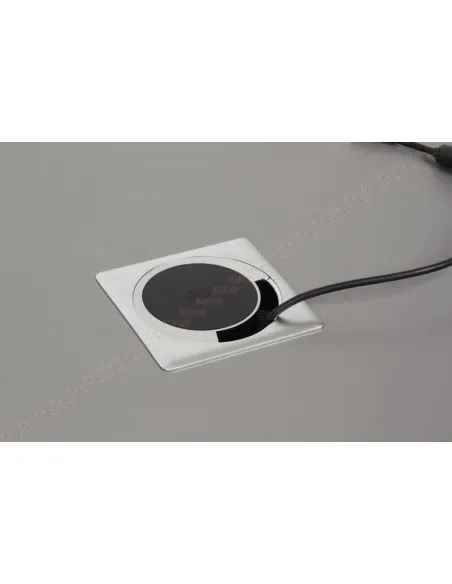 Passe câbles avec chargeur Smartphone par induction.